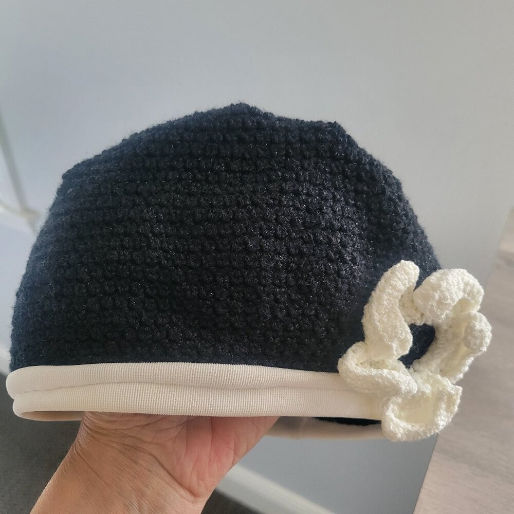 Vintage knitted hat with flower